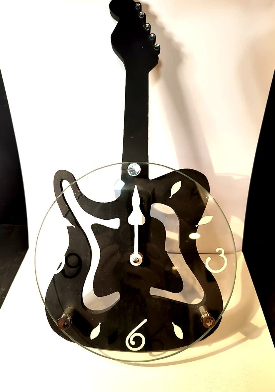 2039. Black Guitar Shaped Clock Glass Front 14 Inches Tall